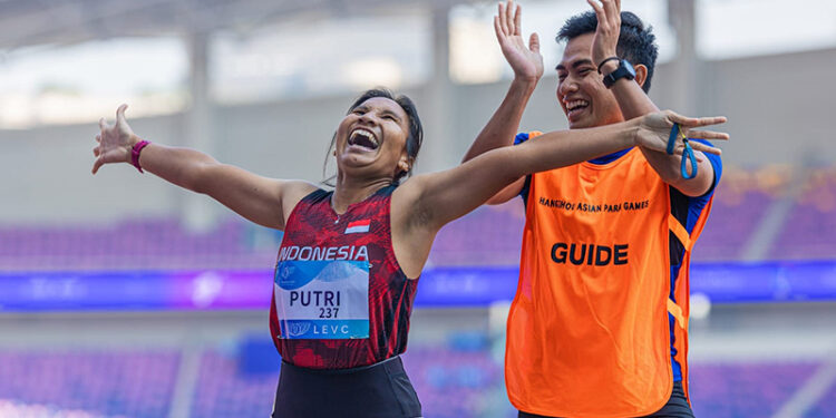 ATLET Para-Atletik Indonesia Ni Made Arianti Putri Sumbang medali emas nomor lari 100 m T12 putri pada Asian Para Games 2022 di Hangzhou, China.