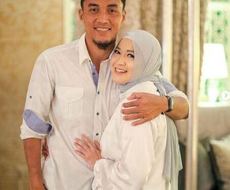 Gunawan Dwi Cahyo dan Okie Agustina