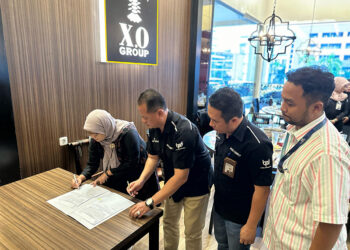 KEPALA Divisi Dana dan Digital Banking Bank Kalsel Suriadi dan Branch Manager PT Taspen (Persero) Cabang Banjarmasin Yuni Dwi Pudjirahayu saat Penandatanganan Berita Acara Hasil Evaluasi Mitra Bayar Periode Juli hingga Desember 2022 dan Periode Januari hingga Juni 2023.