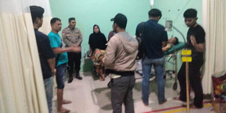 POLRES Tabalong saat mengecek kondisi korban di Puskesmas Muara Uya.