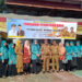 PJ Bupati Tapin M Syarifuddin MPd bersama Ketua TP PKK Masrupah berfoto bersama pada kegiatan pasar murah jelang Bulan Ramadhan yang dilaksanakan dinas perdagangan setempat di Kecamatan Tapin Utara.