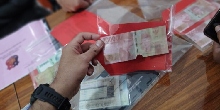 BARANG bukti uang palse yang di sita Polres Balangan.