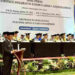 Staf Ahli Gubernur Bidang Pemerintahan, Hukum dan Politik, Adi Santoso, SSos, MSi saat membacakan sambutan tertulis Gubernur Kalsel pada pengukuhan dua orang Guru Besar di Uniska Banjarmasin