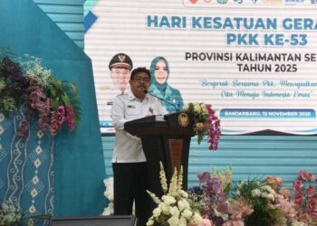 Plt Asisten Bidang Pemerintahan dan Kesra Setdaprov Kalimantan Selatan, Dr HM Muslim saat membacakan sambutan tertulis Gubernur Kalsel pada peringatan Hari Kesatuan Gerak PKK ke-53 tahun 2025 tingkat Provinsi Kalsel