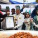 Gubernur Kalimantan Selatan, H Muhidin saat menerima penghargaan dari MURI terkait pemecahan rekor dengan menyediakan 100 ribu porsi hidang khas daging masak habang, pada peringatan Hari Jadi ke-66 Kabupaten Barito Kuala (Batola) tahun 2026