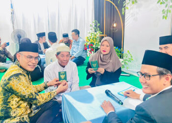 WABUP Syairi Mukhlis saat menghadiri acara nikah massal di Gedung Serbaguna Desa Sampanahan, Kecamatan Sampanahan, Sabtu (14/2).