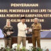 BUPATI Kotabaru H Muhammad Rusli saat menerima LHP atas LKPD Tahun 2025 dari Kepala Perwakilan BPK RI Kalsel Andriyanto.